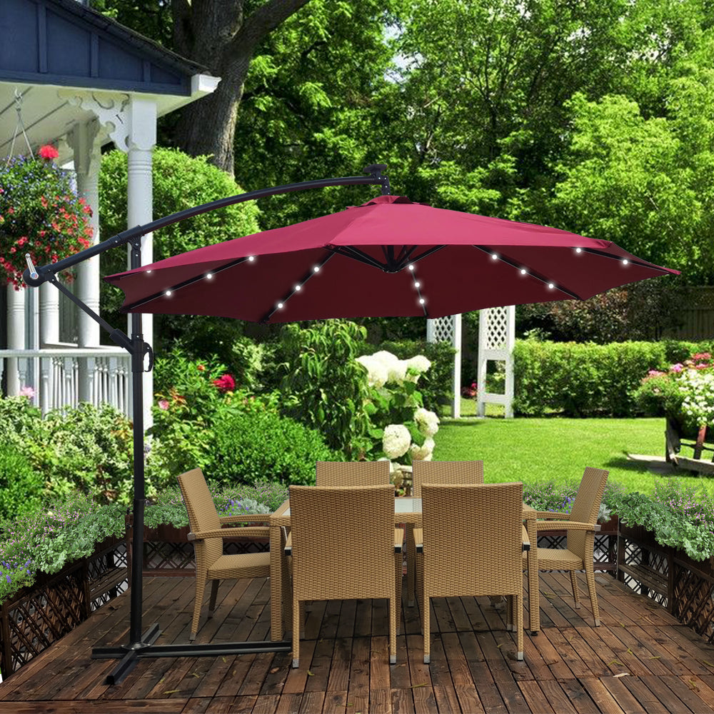 Outdoor Patio Umbrella Solar Powered LED Lighted / Sun Shade with UV & Water Fighting Material and a Sturdy Stand Wine Red